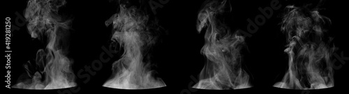 Fotografia Set of steam from round dishes - pots, mugs or cups isolated on black background