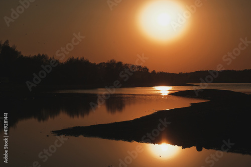 sunset over the river © KrystianZielinski