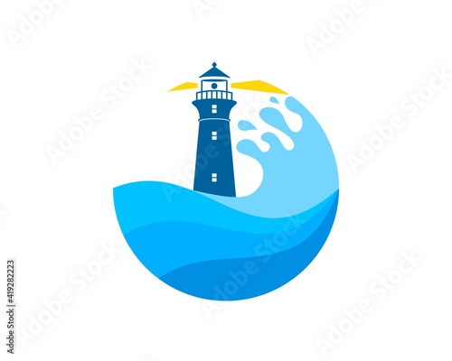 Beautiful beach wave with lighthouse behind