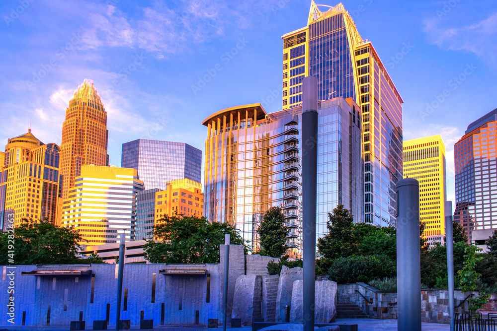 Skyline of Financial district in Charlotte, NC. Uptown Charlotte in NC is famous for financial. The view from Romare Bearden Park. - obrazy, fototapety, plakaty 