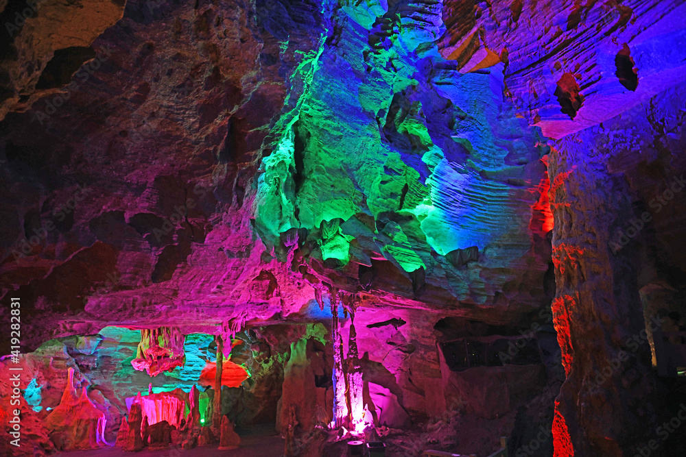 Karst cave with colorful light