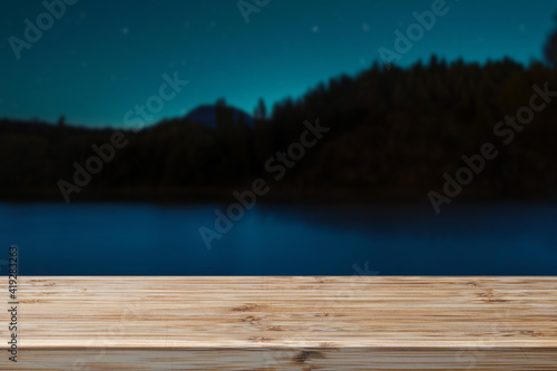 Wooden board empty table in front of blurred background. can be used for display or montage your products.Mock up for display of product © wijhatun