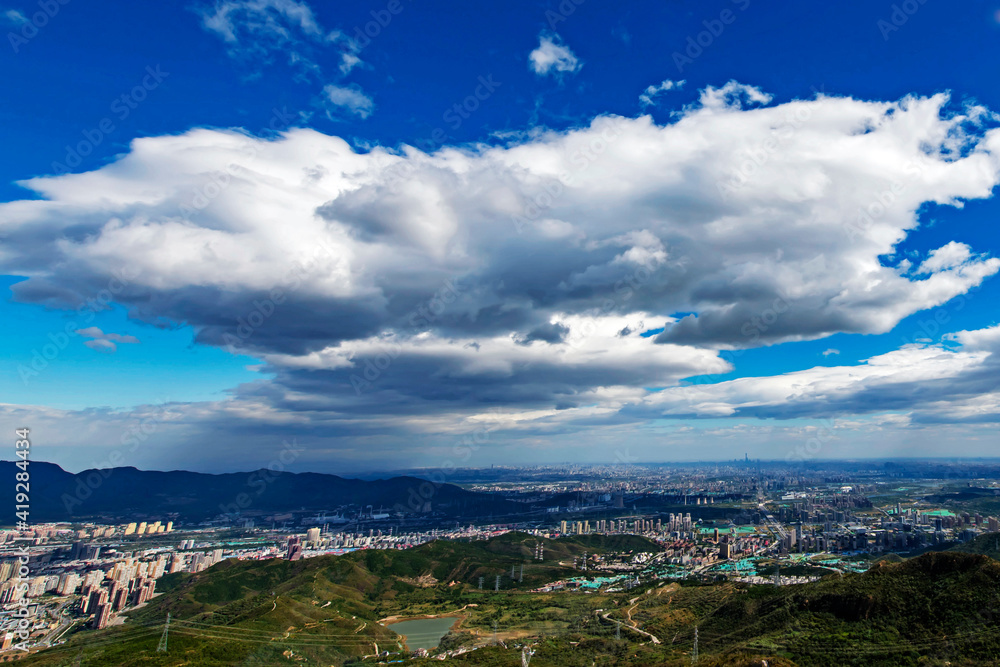 big cloud over beijing city in autumn