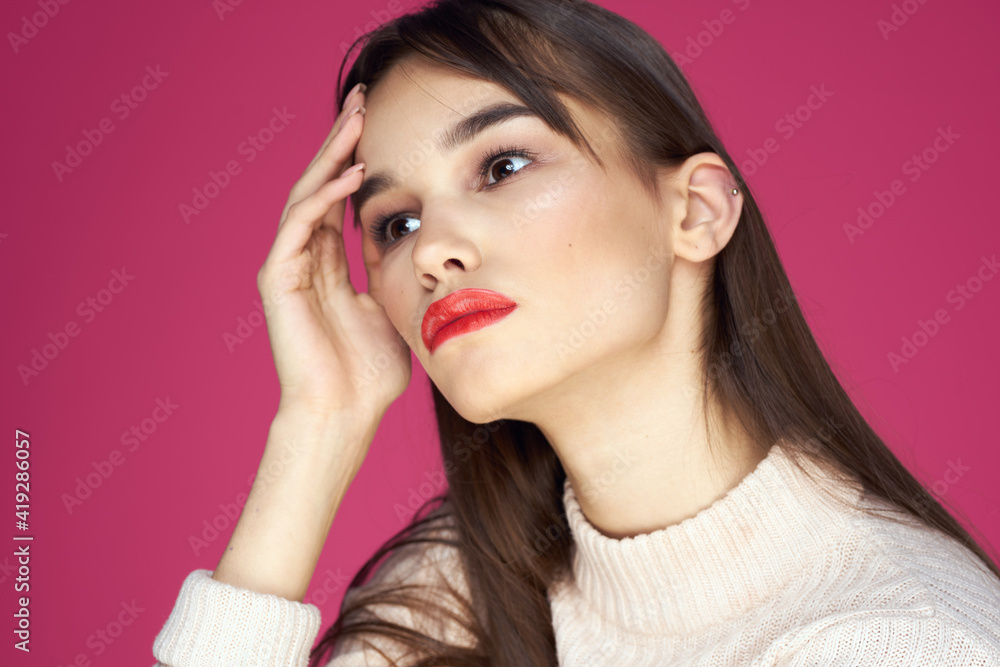 Woman with long hair and red lips white blouse pink background attractive look Woman with long hair and red lips white blouse pink background attractive look
