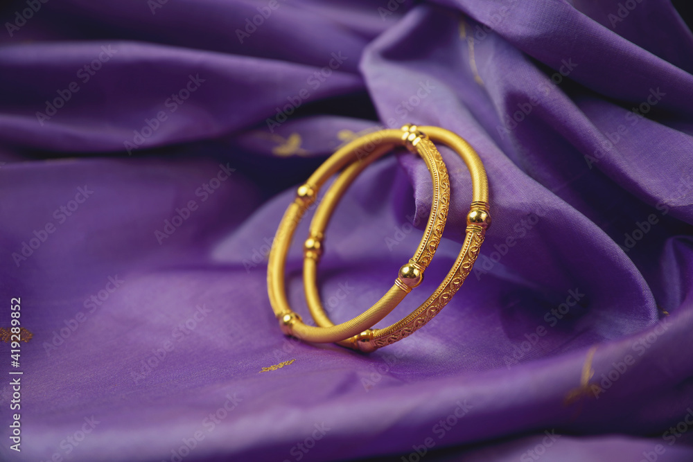 Indian traditional wedding gold Bangles
Indian traditional wedding gold Bangles