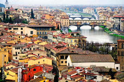 cityscape of florence with old bridge in arno river