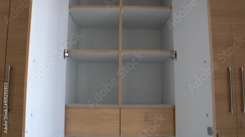 open empty wooden wardrobe showcasing for furniture advertising