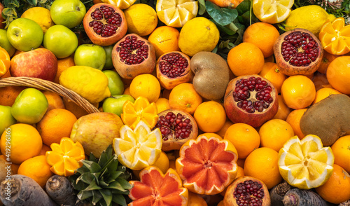 many different healthy and vitamin-rich organic fruits - food backgrounds