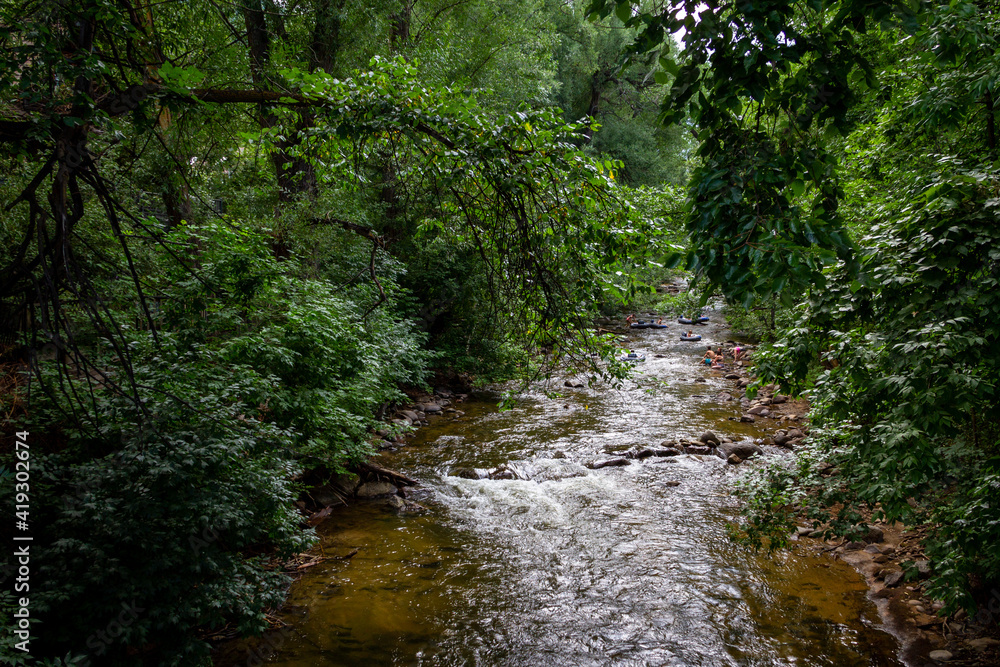 Tubing in Boulder Creek_Boulder, Colorado Tubing in Boulder Creek_Boulder, Colorado