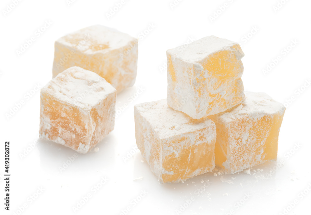 yellow cubes of delight isolated on white yellow cubes of delight isolated on white