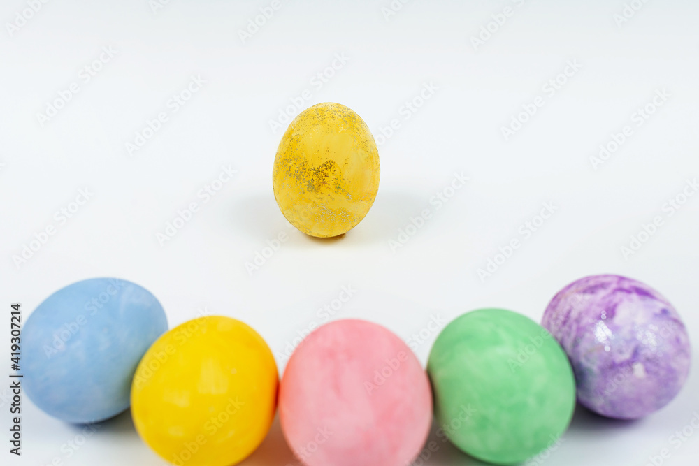 Easter egg decorated with glitter. Easter eggs on a white background Easter egg decorated with glitter. Easter eggs on a white background