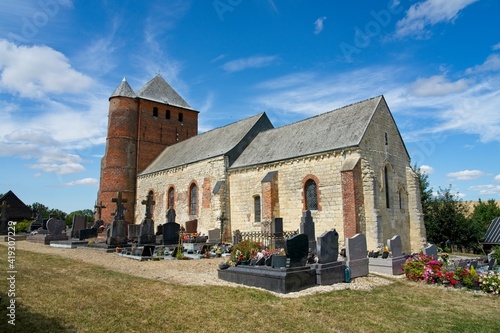 Hary France - 1 August 2020 - Fortified church (Eglise Saint-Corneille-et-Saintin) Hary (Aisne - Thiérache) France photo