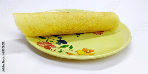 Fototapeta Naklejka Na Ścianę i Meble -  Paper Masala dosa is a South Indian meal served with sambhar and coconut chutney Selective focus - Image