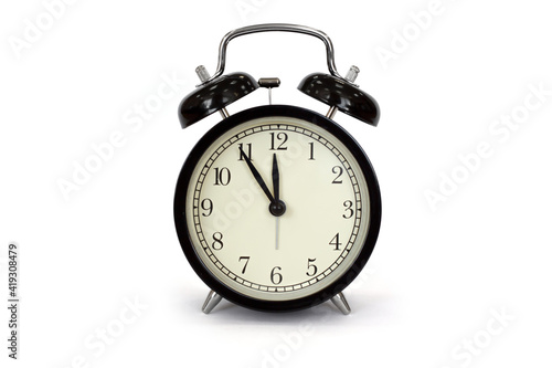 Alarm clock on the white background