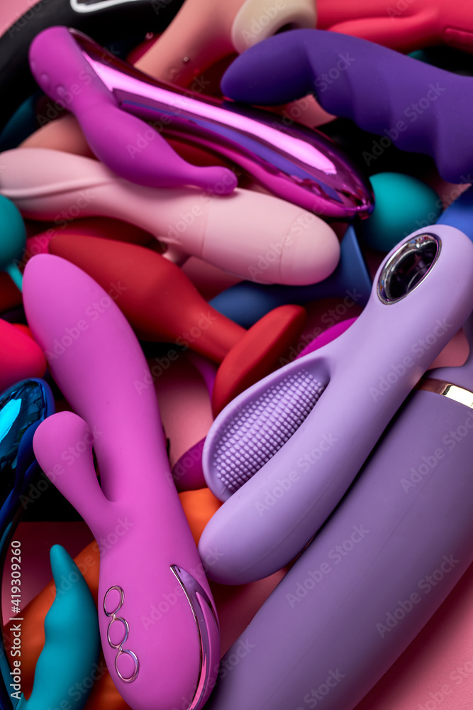 masturbation, sex toy, female orgasm. stack of rubber sex toys, big amount  of silicone dildos for women. sex shop concept Stock 写真 | Adobe Stock