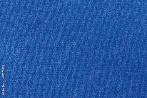 Dark blue fabric texture background, seamless pattern of natural textile surface.