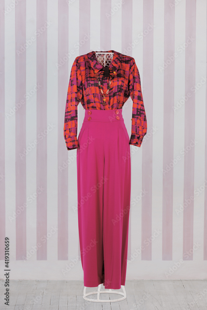 Fashionable winter and autumn women clothes. Studio shoot Fashionable winter and autumn women clothes. Studio shoot