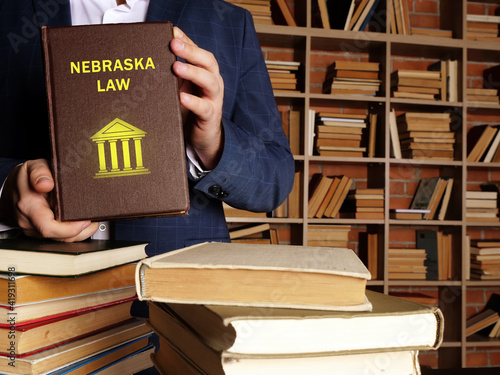  NEBRASKA LAW inscription on the sheet. Nebraska residents are subject to Nebraska state and U.S. federal laws photo