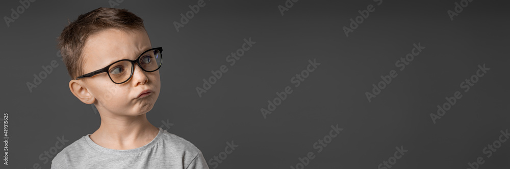 child looking into wide angle lens on white background child looking into wide angle lens on white background
