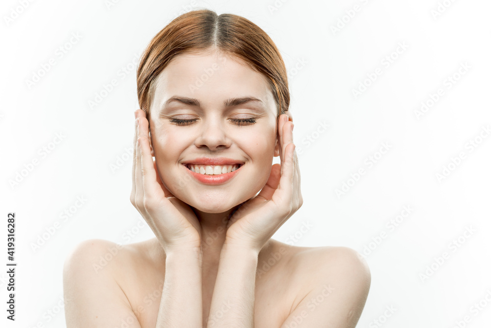 attractive woman holding face closed eyes charm naked shoulders attractive woman holding face closed eyes charm naked shoulders