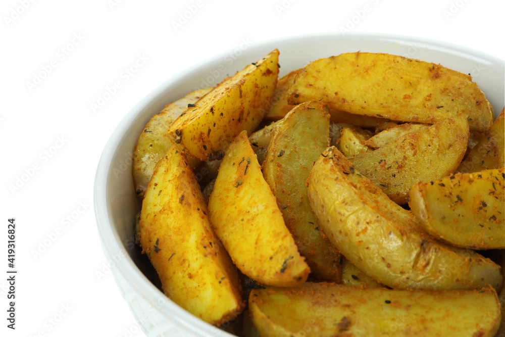 Bowl with baked potato wedges isolated on white background Bowl with baked potato wedges isolated on white background