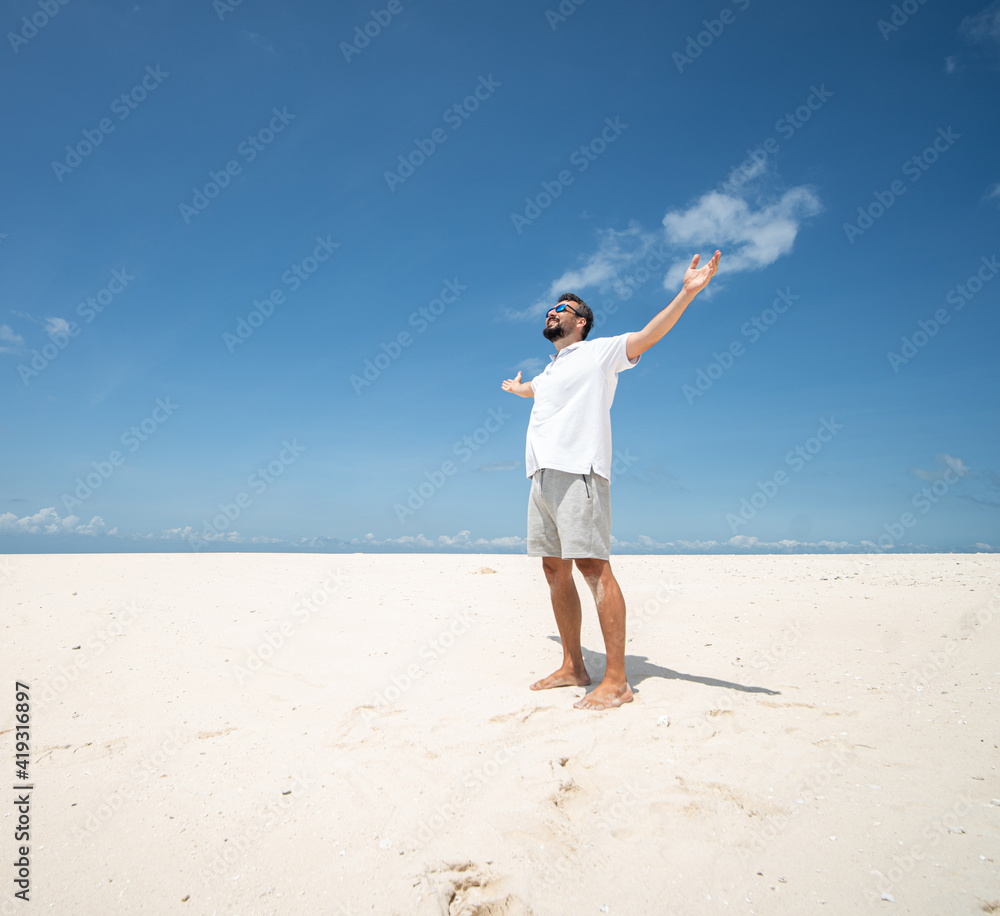 One man is enjoying beautiful tropical beach One man is enjoying beautiful tropical beach