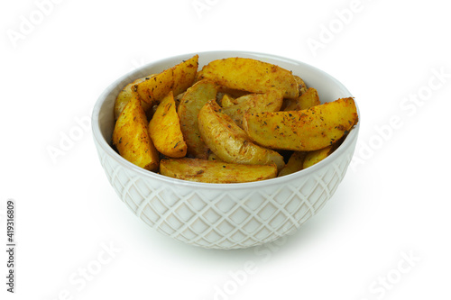 Bowl with baked potato wedges isolated on white background