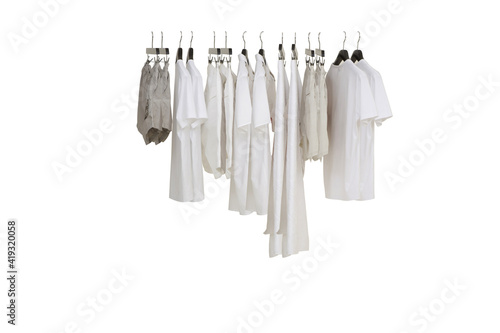 Elegant and trendy clothes for women hanging.