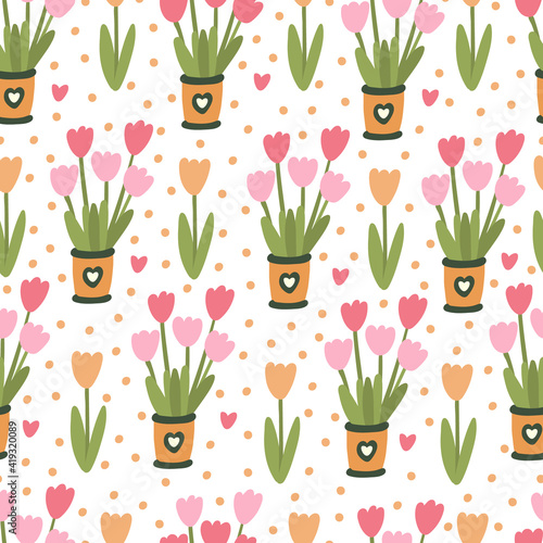 Spring floral seamless pattern. Pink and orange tulip flowers in pots. Great for fabrics, wrapping papers, covers. Vector hand drawn illustration on white background.