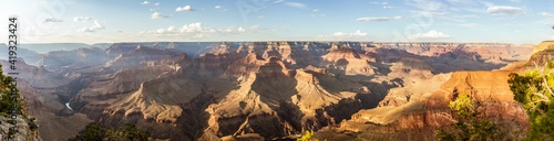 Mountains, hills and canyons of Grand canyon national park in mornign haze and sunshine, america