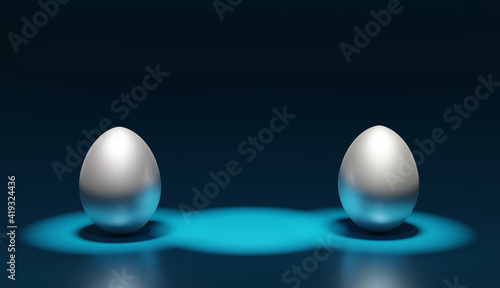 2 silver eggs on a blue background  backlit. 3d renderer