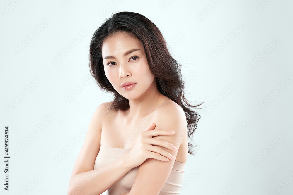 Beautiful young asian woman with clean fresh skin on white background, Face care, Facial treatment, Cosmetology, beauty and spa, Asian women portrait Beautiful young asian woman with clean fresh skin on white background, Face care, Facial treatment, Cosmetology, beauty and spa, Asian women portrait