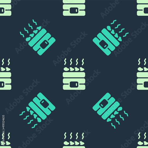 Green and beige Hot sauna stones icon isolated seamless pattern on blue background. Spa resort recreation, bathhouse relaxation. Hot stones on electric heater. Vector.