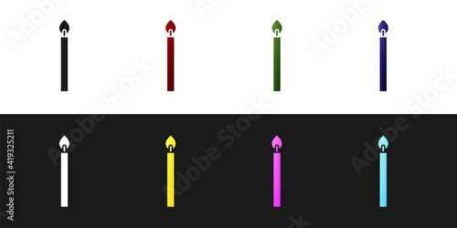 Set Burning candle icon isolated on black and white background. Cylindrical candle stick with burning flame. Vector.