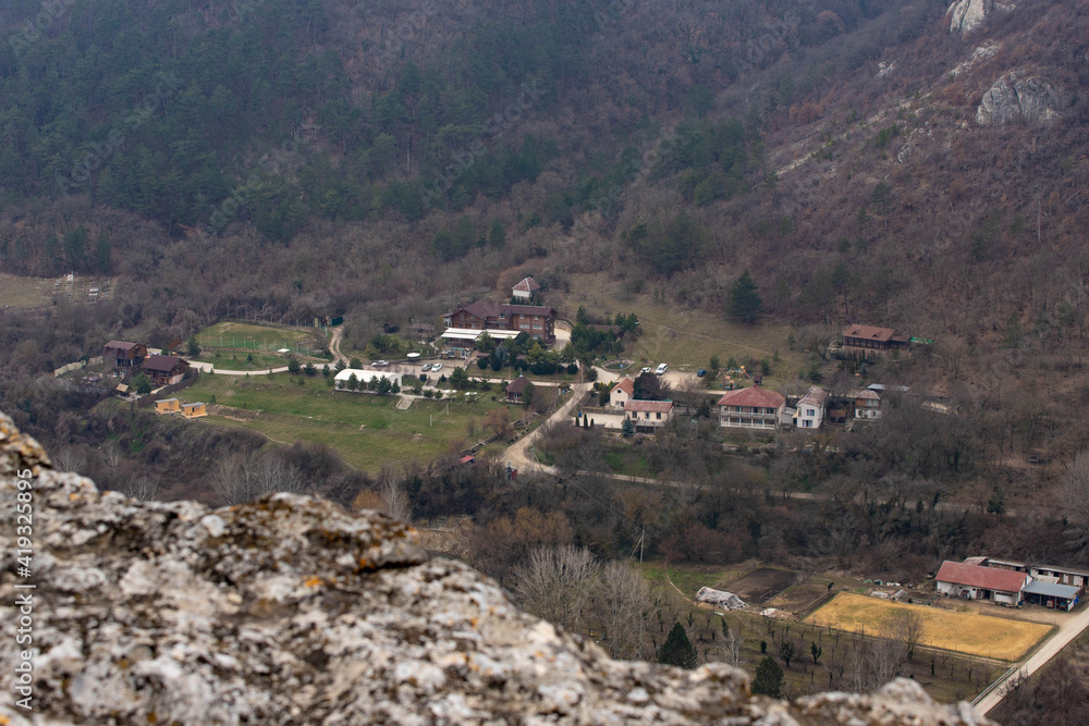 view of the valley with houses from the mountain
