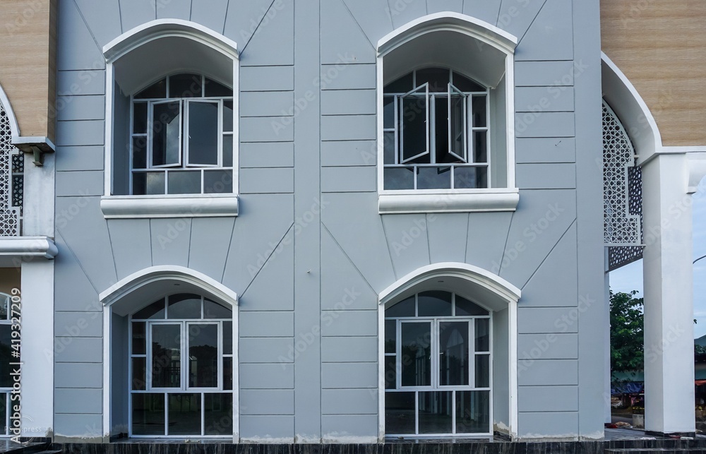 Minimalist house window. Modern style glass windows. Big windows vintage model. 
