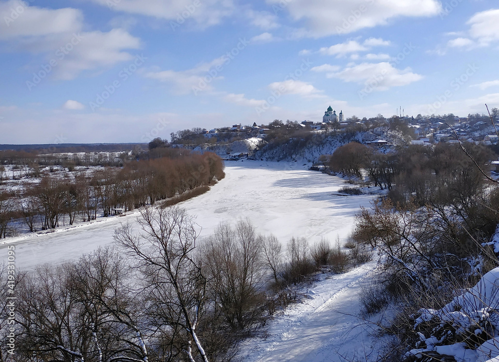 View from the high right bank to the turn of the Desna River and the city in the hills