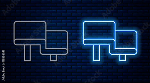 Glowing neon line Sauna wood bench icon isolated on brick wall background. Vector.
