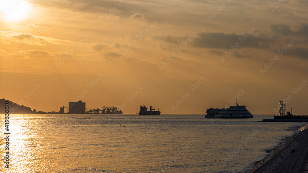Shipping and a ferry on the Tagus River
