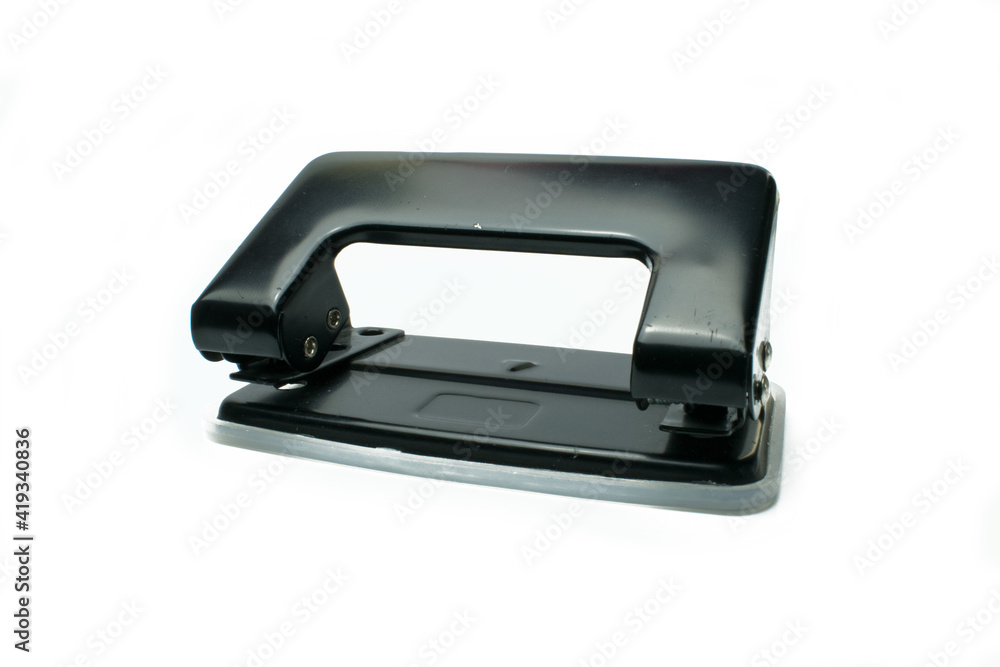 Office paper perforator on white background Office paper perforator on white background