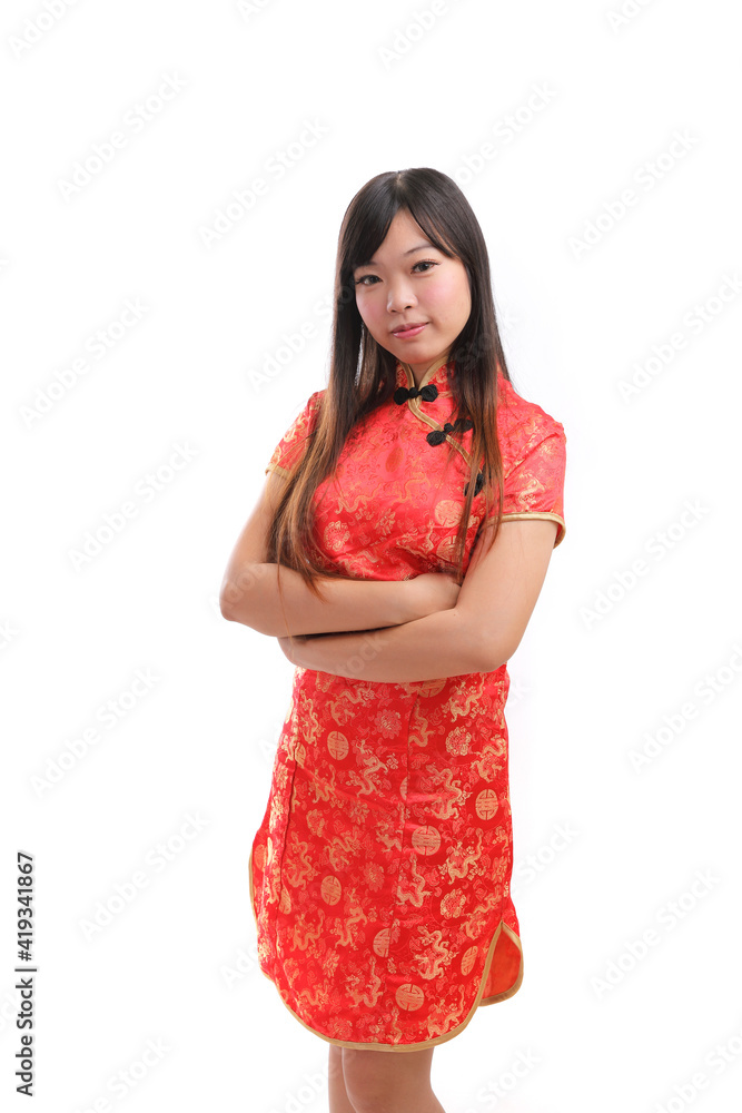 beauty woman wear red cheongsam looking and smile in chinese new year