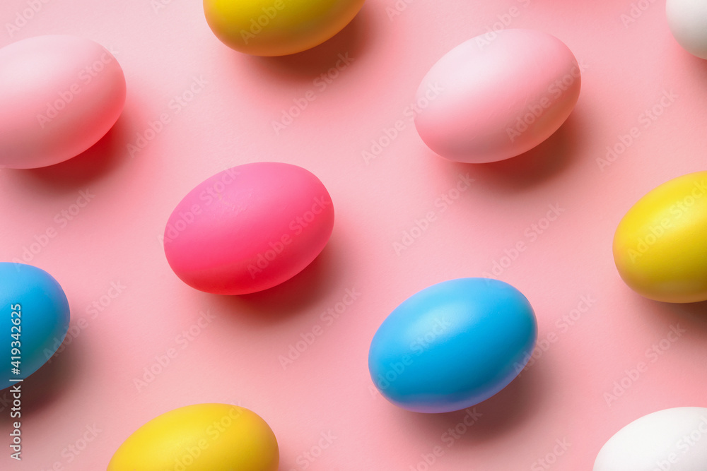 Pattern made of eggs on pastel pink background, minimal easter concept Pattern made of eggs on pastel pink background, minimal easter concept