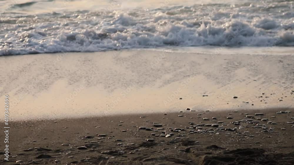 Sea shore with stones and foam, pebble seascape. Sea shore with stones and foam, pebble seascape.