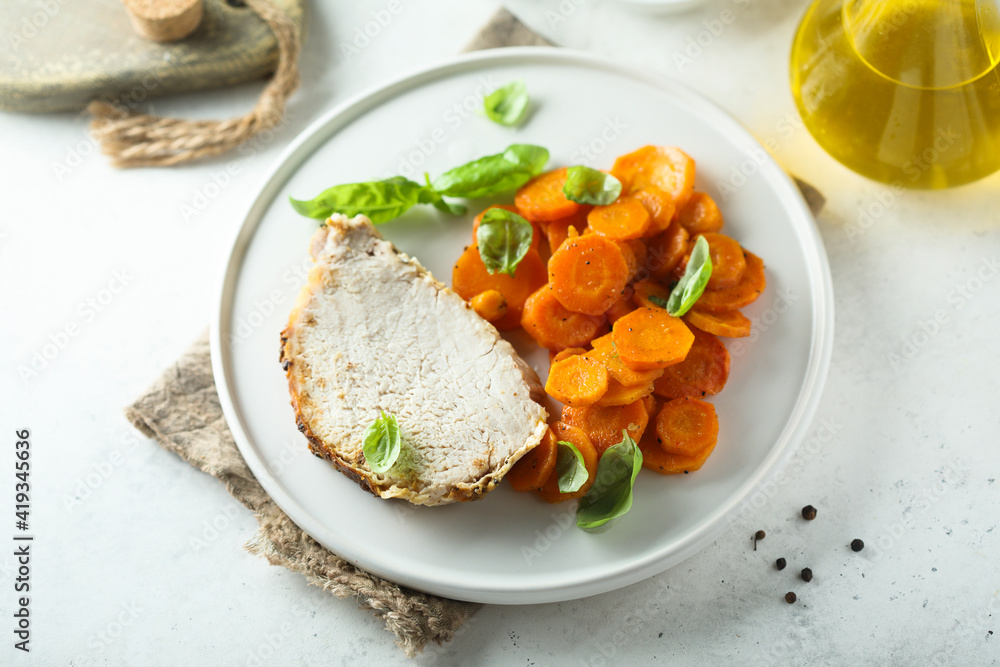 Roasted pork with carrot and basil Roasted pork with carrot and basil