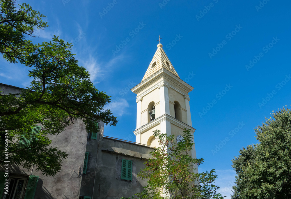 The church tower of Santa Maria Assunta in the fishing village of Saint Florent, Corsica France