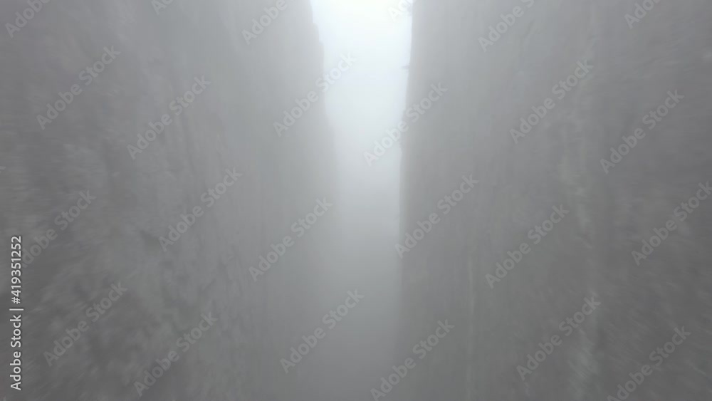Camera floats through a misty (and cinematic) canyon in a National Park, Sweden Camera floats through a misty (and cinematic) canyon in a National Park, Sweden