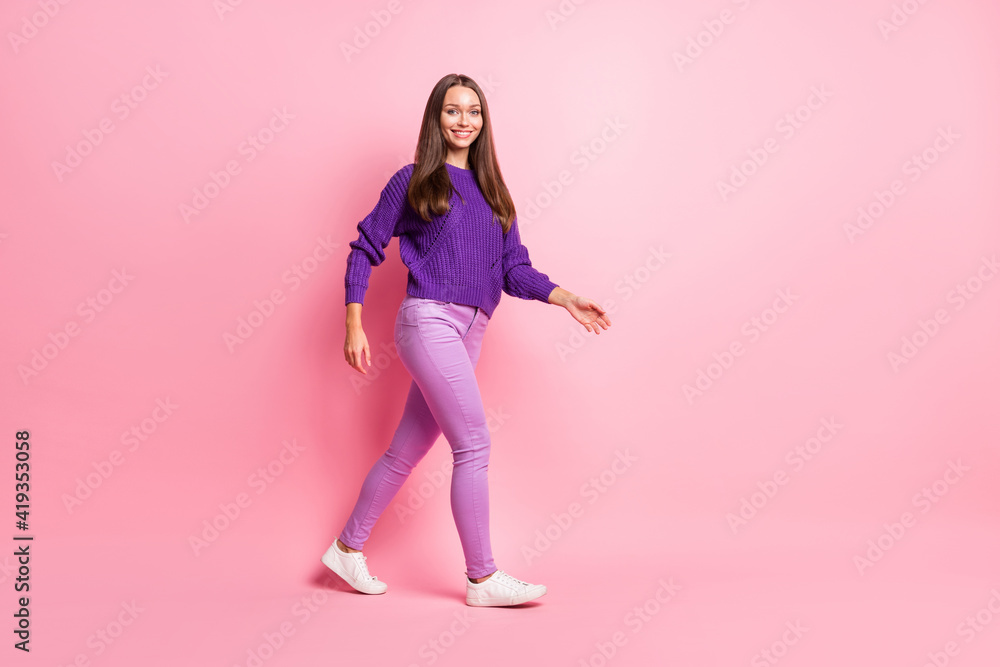 Full size profile photo of optimistic girl do selfie point up wear lilac sweater sneakers isolated on pastel pink color background
