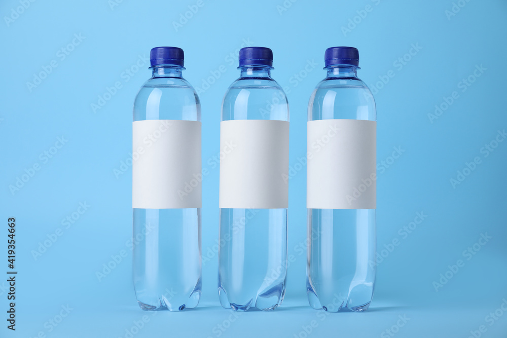 custom made wallpaper toronto digitalPlastic bottles with soda water on light blue background