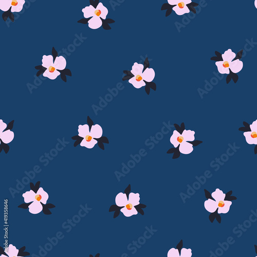 Ditsy flower seamless vector pattern. Delicate pink small scattered flowers on a blue background. Cute romantic floral Folk art flowers for fabric, nursery, home decor, wallpaper, spring decor.