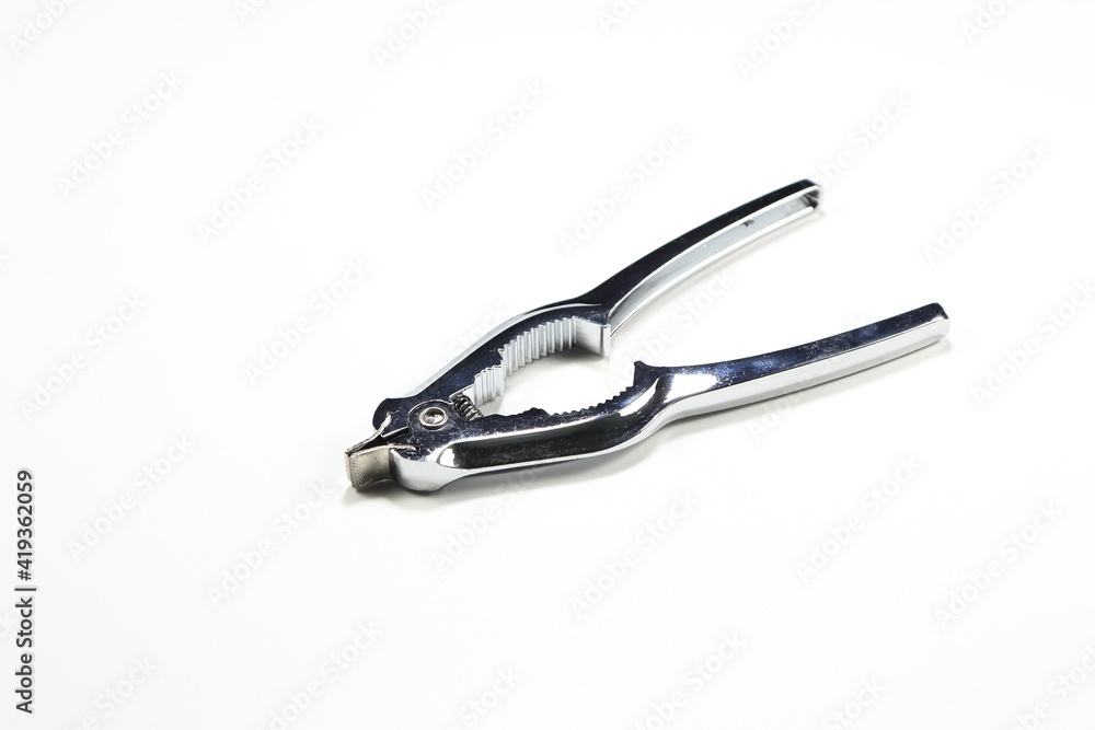 Classic stainless food plier isolated on the white background. Famous kitchenware in Asia. Classic stainless food plier isolated on the white background. Famous kitchenware in Asia.